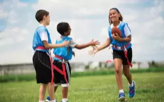 Co-ed flag football players 